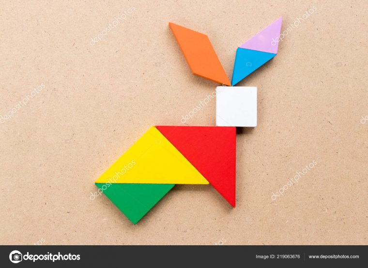 Color Tangram Puzzle Rabbit Shape Wood Background — Stock tout Tangram Lapin