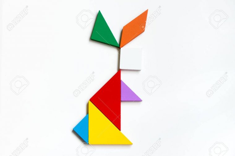 Colorful Wood Tangram Puzzle In Sitting Rabbit Shape On White.. tout Tangram Lapin