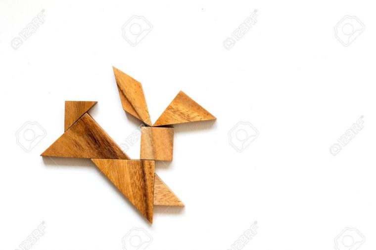 Wooden Tangram As Running Rabbit Shape On White Background intérieur Tangram Lapin