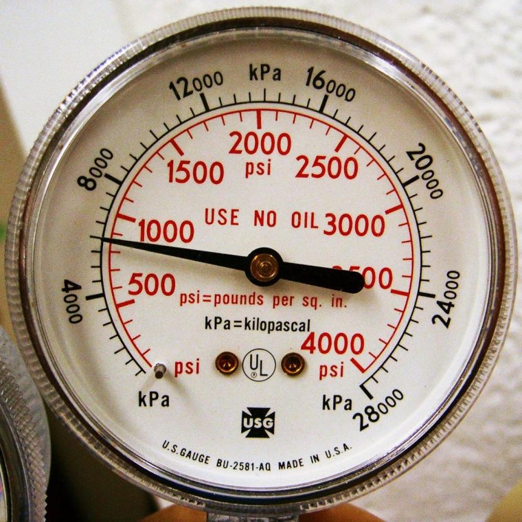 55 psi in bar