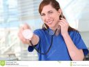 Nurse With Stethoscope At Hospital Stock Photos - Image serapportantà Stethoscopeexamnurse