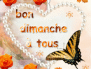 A Heart Shaped Frame With Flowers And A Butterfly In The Middle à Bon Dimanche Gif intéressant