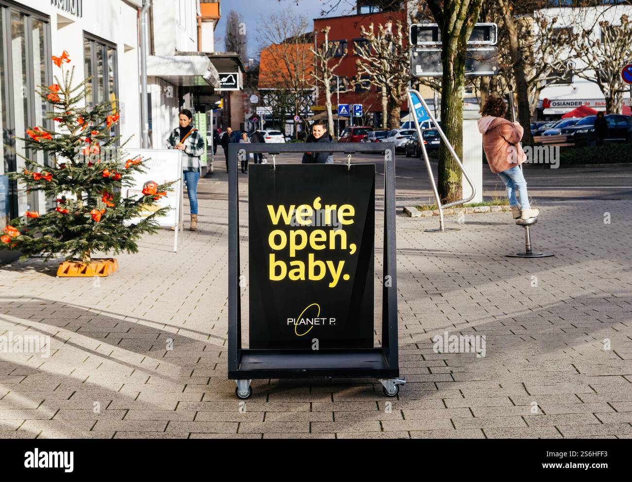  Achern, Germany - Jan 3, 2025: A festive street scene featuring a Bildidee 